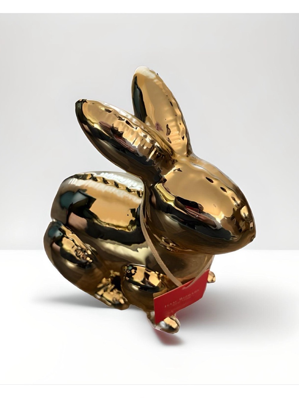 Isaac Mizrahi New York Shiny Gold Bunny Rabbit inflated ballon sculpture.